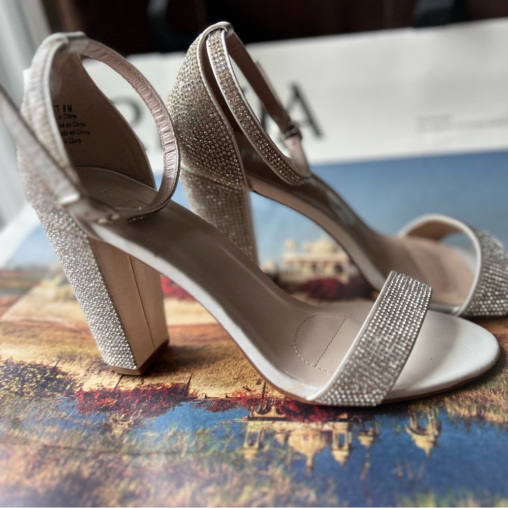 Selling high heels from David's bridal.